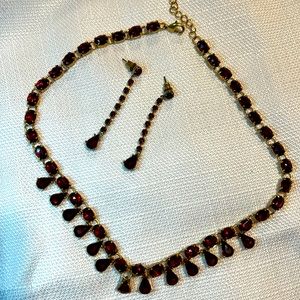 Red jeweled necklace and earrings